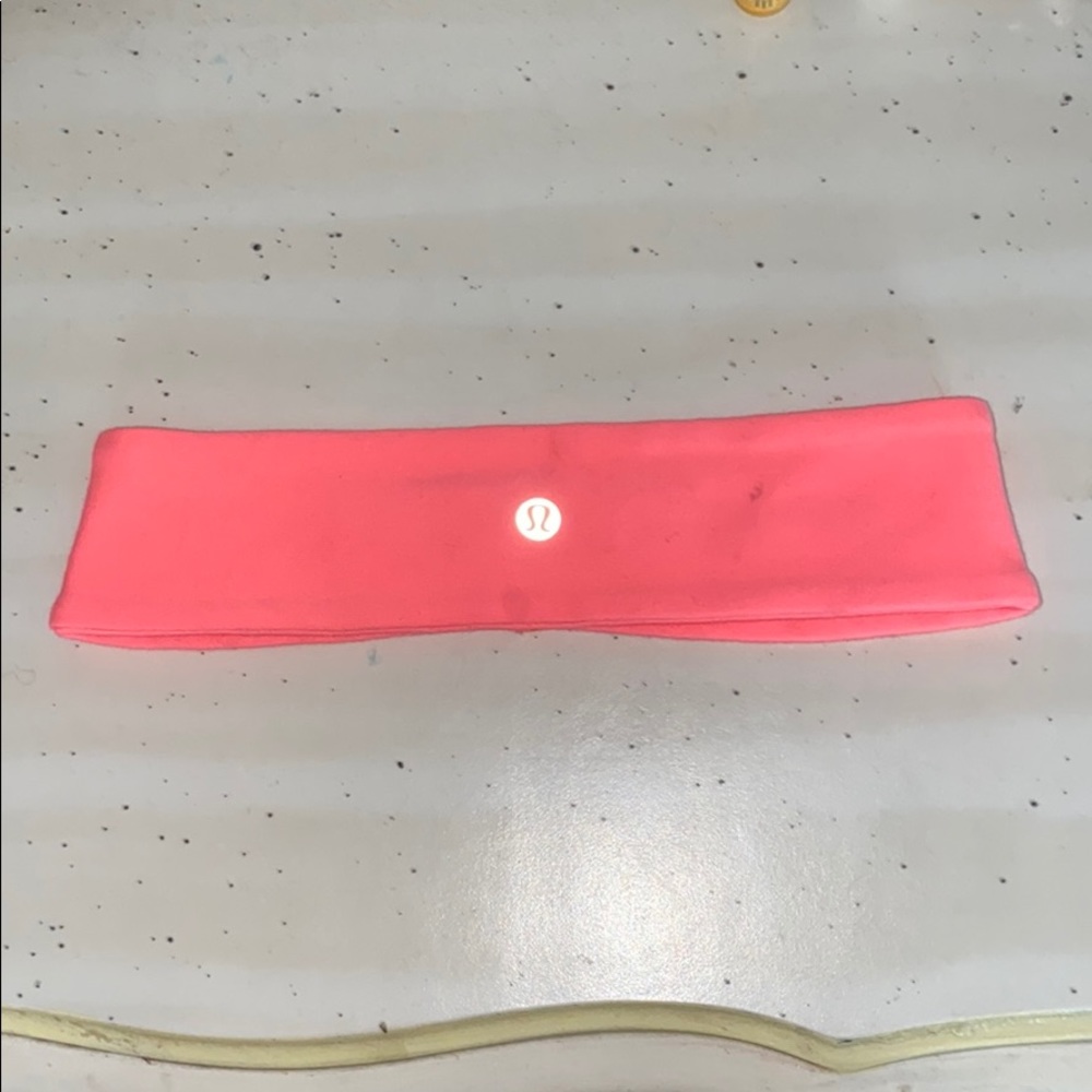 Coral lululemon headband with black bag